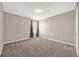 Bedroom featuring neutral paint, carpet flooring, one window with modern print curtains, and a closet at 5607 Western Sky Pl, St Cloud, FL 34771