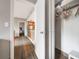 View of a closet and kitchen, featuring wood cabinets and stainless steel appliances at 6165 Carrier Dr # 1504, Orlando, FL 32819