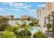 Beautiful view of pool and building with resort-style amenities at 6165 Carrier Dr # 1504, Orlando, FL 32819