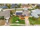 Aerial view of a single Gathering house showing the solar panels, fenced yard, and landscaping at 8128 Hook Cir, Orlando, FL 32836