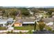 Wide aerial showing home with backyard, solar panels, pool and neighborhood at 8128 Hook Cir, Orlando, FL 32836