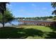 Lakeside community dock with stunning water views, perfect for peaceful moments and community gatherings at 8128 Hook Cir, Orlando, FL 32836