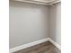 Closet features wood-look floors, white walls, and a hanging rod at 97 Lake Villa Way, Kissimmee, FL 34743