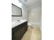 Bathroom with a vanity, toilet, and shower tub at 10861 Windsor Walk Dr # 101, Orlando, FL 32837