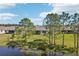 Back of house from the lake with large backyard at 1098 Victoria Hills S Dr, Deland, FL 32724