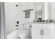 Well-lit bathroom featuring shower over bath and modern vanity at 1098 Victoria Hills S Dr, Deland, FL 32724