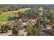 A landscape shot showcasing the community clubhouse on a golf course at 1098 Victoria Hills S Dr, Deland, FL 32724