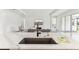 Modern kitchen featuring a large island with a sink and an open floor plan at 1098 Victoria Hills S Dr, Deland, FL 32724