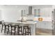 Spacious kitchen features an island with seating, stainless appliances, and modern finishes at 1098 Victoria Hills S Dr, Deland, FL 32724