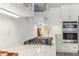 Modern kitchen features a gas cooktop, sleek countertops, and stainless steel appliances at 1098 Victoria Hills S Dr, Deland, FL 32724