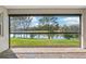 Enjoy serene lake views from the screened lanai at 1098 Victoria Hills S Dr, Deland, FL 32724