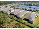This aerial view shows the homes in the community with mature landscaping at 1121 Avery Meadows Way, Deland, FL 32724