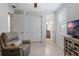 This sitting room offers access to the bathroom and bedrooms at 1121 Avery Meadows Way, Deland, FL 32724