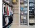 This walk-in closet has custom shelving and storage for organization at 1121 Avery Meadows Way, Deland, FL 32724