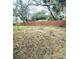 Spacious, partially cleared backyard ready for landscaping and outdoor activities at 1200 Jarecki Ave, Holly Hill, FL 32117