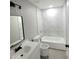 Modern bathroom with a bathtub and shower featuring stylish fixtures and finishes at 1200 Jarecki Ave, Holly Hill, FL 32117