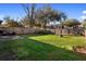 Large fenced backyard featuring a well-maintained lawn, perfect for Gathering activities and pets at 1207 Rich Moor Cir, Orlando, FL 32807