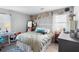 Inviting bedroom with neutral walls, basket decorations, and a comfortable bed at 1207 Rich Moor Cir, Orlando, FL 32807