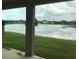 Take in calming water views from the comfort of the home's patio at 12126 Homestead Park Ln, Orlando, FL 32824