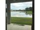 Enjoy serene water views from the patio of this lovely home at 12126 Homestead Park Ln, Orlando, FL 32824