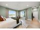 Primary bedroom with ceiling fan, natural light, and backyard views at 1320 Myrtle Dr, Longwood, FL 32750