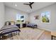 Bedroom features two beds, hardwood floors, a ceiling fan and plenty of natural light from two windows at 1320 Myrtle Dr, Longwood, FL 32750