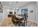 Dining room with stylish chandelier, large table and seating, perfect for gatherings at 1320 Myrtle Dr, Longwood, FL 32750