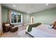 Relaxing main bedroom features a cozy reading nook, walk-in closet, and a plush, textured rug at 1320 Myrtle Dr, Longwood, FL 32750