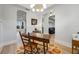 Office space with charming desk and chair, with views into the living room and dining room at 1320 Myrtle Dr, Longwood, FL 32750