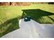 Well-maintained backyard featuring green grass and a concrete patio at 1392 Zeek Ridge St, Clermont, FL 34715