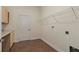 Practical laundry area with ample storage and organization space at 1392 Zeek Ridge St, Clermont, FL 34715