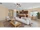 Open living area featuring a modern kitchen, dining space, and a comfortable seating area at 1392 Zeek Ridge St, Clermont, FL 34715