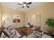 Comfortable office featuring modern furniture, wood floors, and a neutral color scheme at 1392 Zeek Ridge St, Clermont, FL 34715