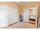 Bedroom with large closet and door that goes into the bathroom at 1401 Royal Saint George Dr, Orlando, FL 32828
