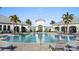 Resort-style community pool with ample lounging space, perfect for relaxation at 14146 Lanikai Beach Dr, Orlando, FL 32827
