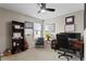 Comfortable home office with bright light and dark accents at 14146 Lanikai Beach Dr, Orlando, FL 32827