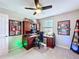 Office featuring a desk with hutch, office chair, and natural light at 16133 Pebble Bluff Loop, Winter Garden, FL 34787