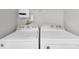 Close up view of a white washing machine and dryer at 193 Longview Ave # 104, Kissimmee, FL 34747