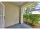 Outdoor patio space with a view of the garden at 193 Longview Ave # 104, Kissimmee, FL 34747