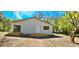 Single Gathering home featuring backyard porch at 20660 Se 155Th St, Umatilla, FL 32784