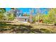 Back view of home and lot showcasing ample outdoor space at 20660 Se 155Th St, Umatilla, FL 32784