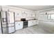 Modern kitchen showcasing stainless steel refrigerator and sleek design at 20660 Se 155Th St, Umatilla, FL 32784