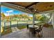 Backyard with a seating area and tennis courts at 2118 Lake Dr, Winter Park, FL 32789
