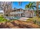 Stunning two-story home boasting an outdoor swimming pool, spacious balconies and picturesque waterfront views at 2118 Lake Dr, Winter Park, FL 32789