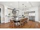 Modern kitchen with a large island, stainless steel appliances, and sleek design at 2118 Lake Dr, Winter Park, FL 32789