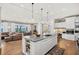 Gourmet kitchen with a large island, stainless steel appliances, and open to the living space at 2118 Lake Dr, Winter Park, FL 32789