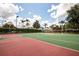 Outdoor basketball court with well-maintained playing surface, providing a perfect spot for sports and recreation at 2304 Silver Palm Dr # 103, Kissimmee, FL 34747