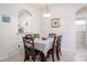 Cozy dining area with seating for six, neutral decor, and ample natural light at 2304 Silver Palm Dr # 103, Kissimmee, FL 34747