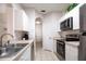 Well-equipped kitchen with stainless appliances, ample counter space, and efficient layout at 2304 Silver Palm Dr # 103, Kissimmee, FL 34747