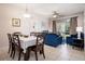 Open-concept living space with dining area, comfortable seating, and plenty of natural light at 2304 Silver Palm Dr # 103, Kissimmee, FL 34747